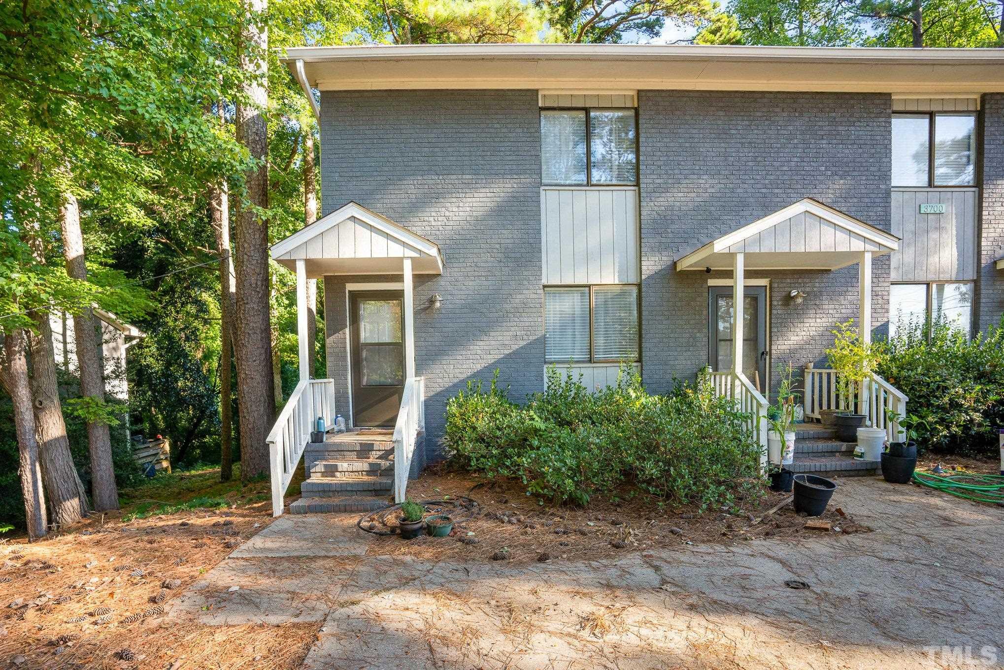 3700 Greenleaf Street Raleigh, NC 27606 - Photo 5 of 13 a front view of a house with garden