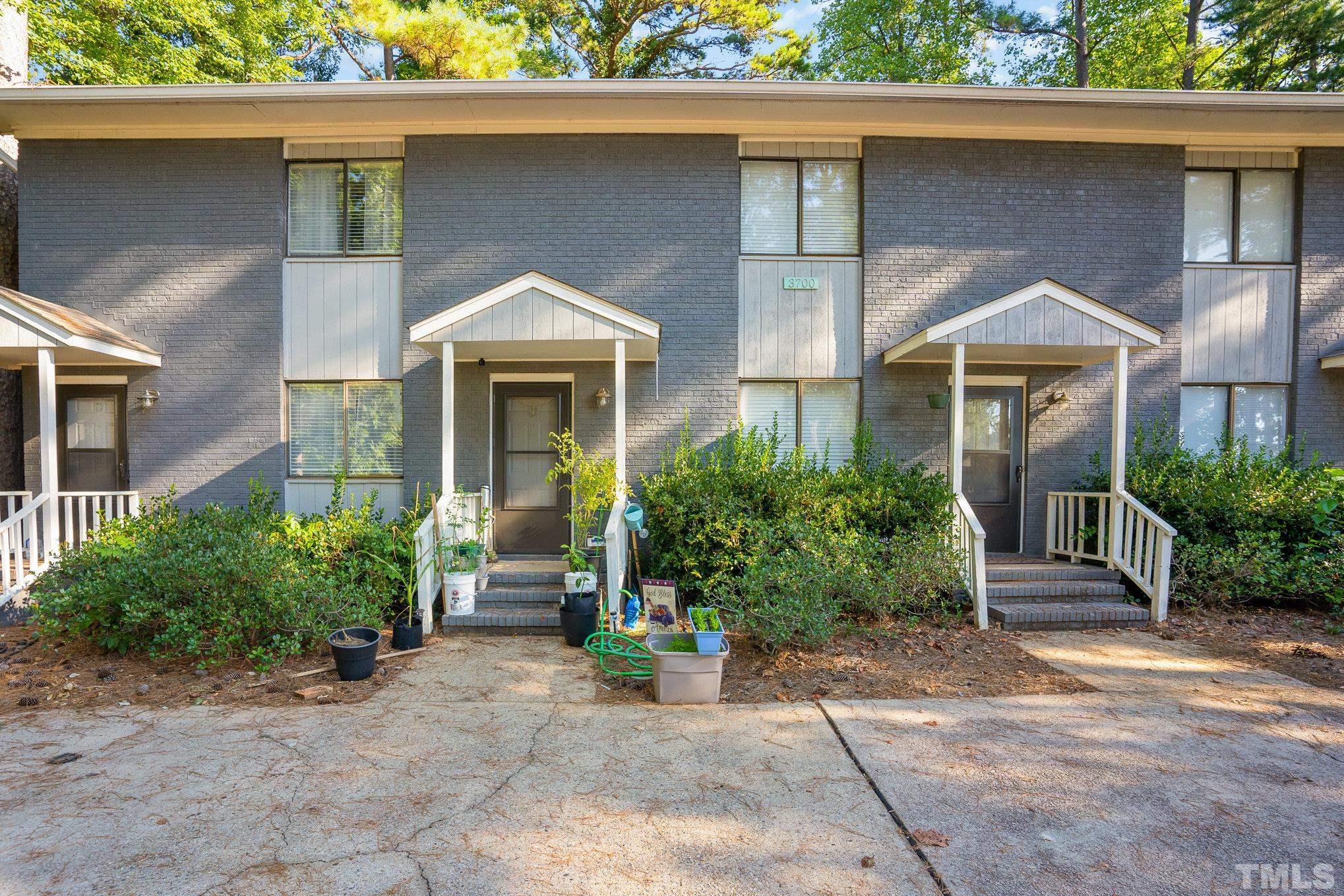 3700 Greenleaf Street Raleigh, NC 27606 - Photo 6 of 13 a front view of a house with garden