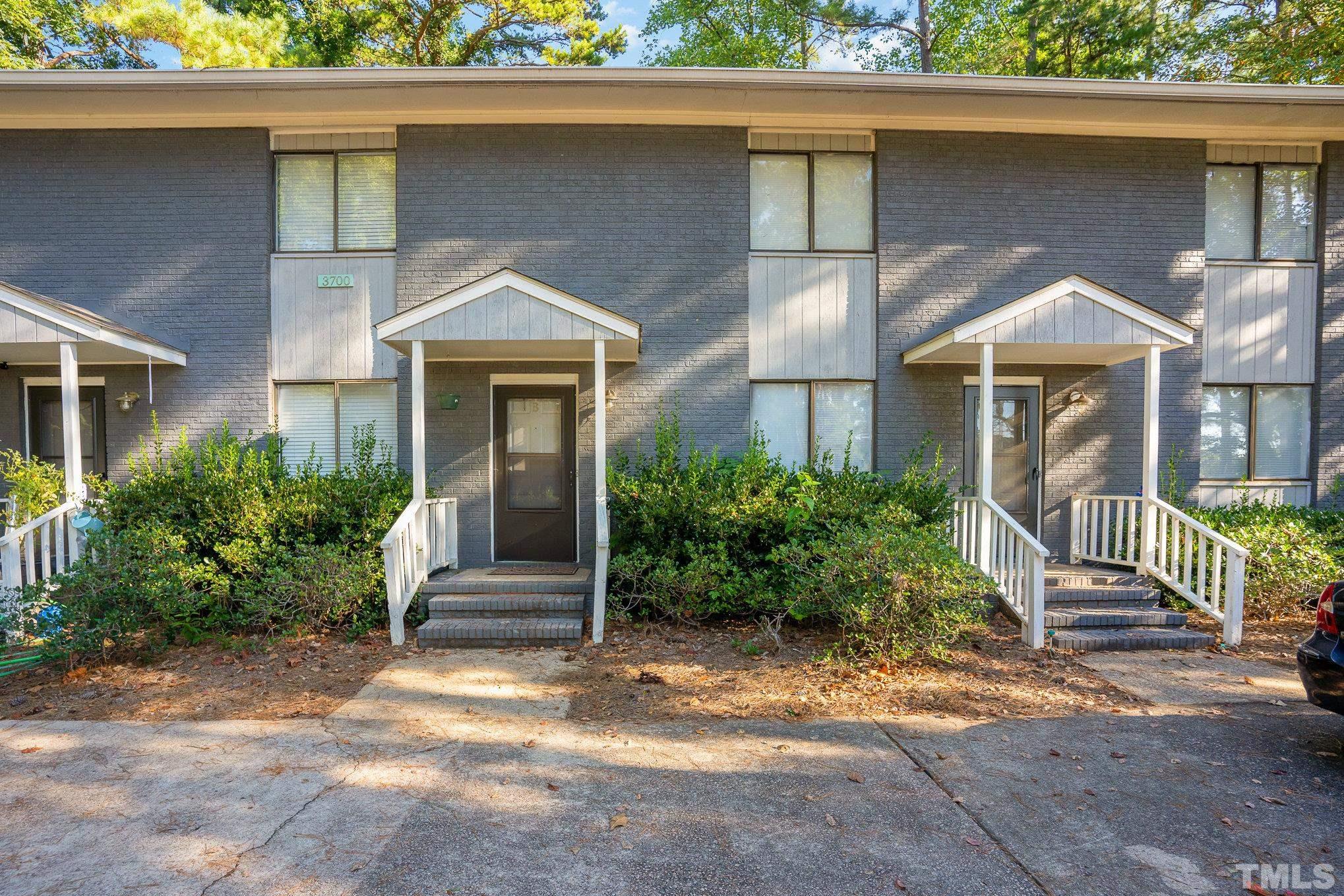 3700 Greenleaf Street Raleigh, NC 27606 - Photo 7 of 13 a front view of a house with garden