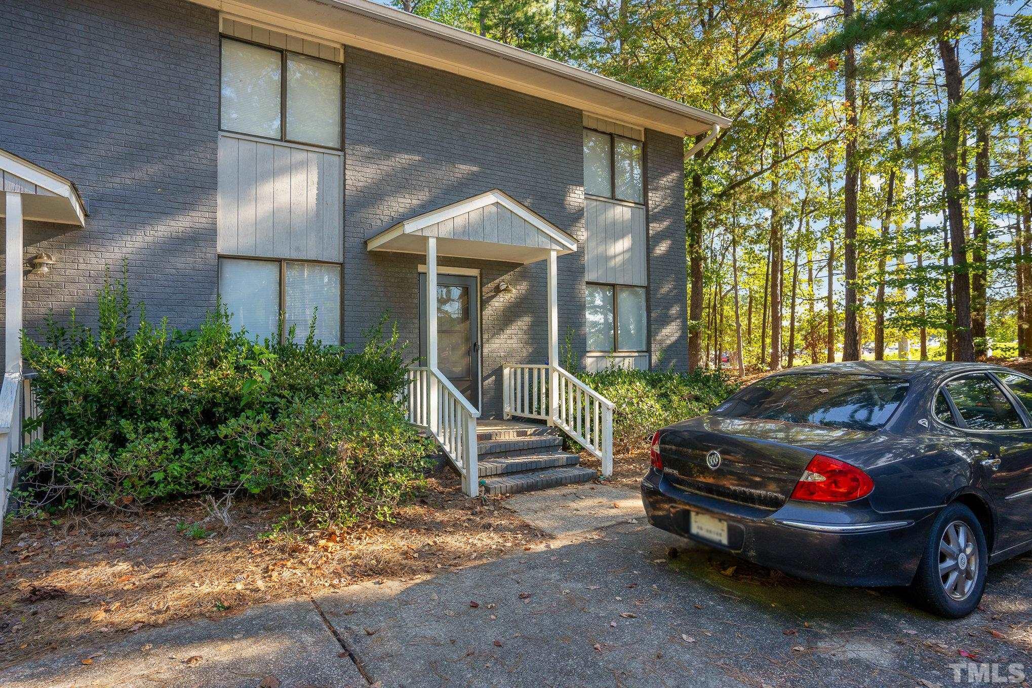 3700 Greenleaf Street Raleigh, NC 27606 - Photo 8 of 13 a view of a car is parked in front of a house
