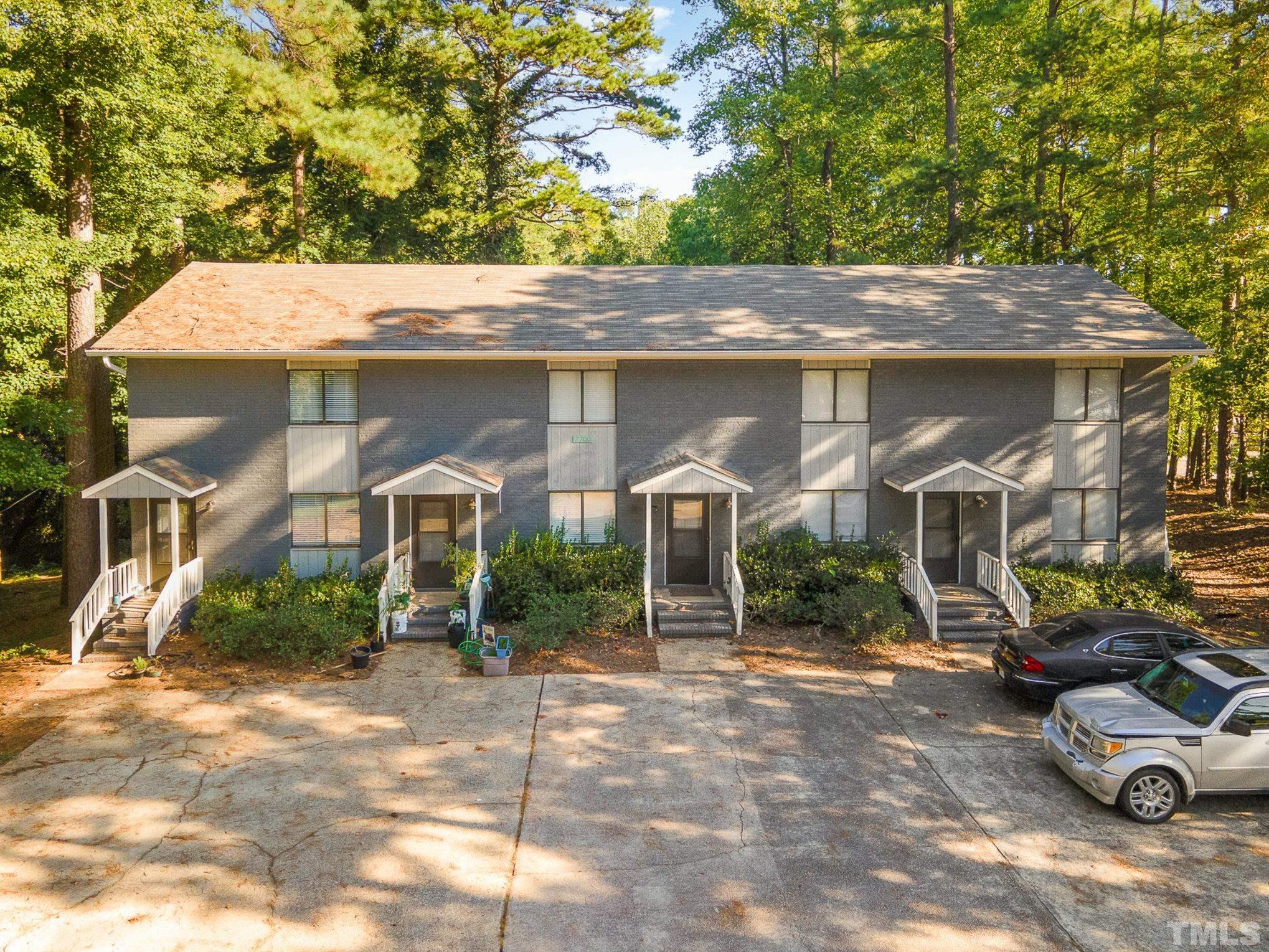 3700 Greenleaf Street Raleigh, NC 27606 - Photo 9 of 13 a front view of a house with garden