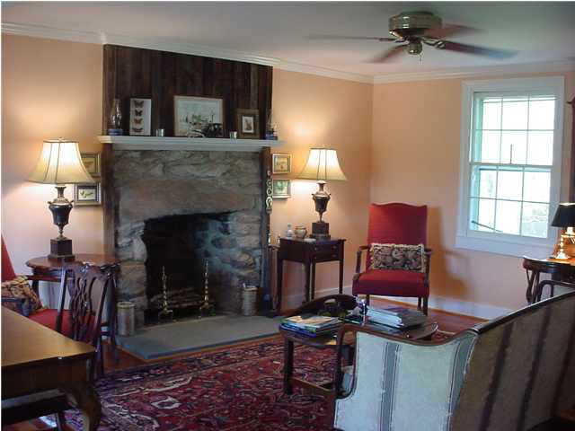1110 Venable Road Palmyra, VA 22963 - Photo 4 of 5 a living room with furniture and a fireplace