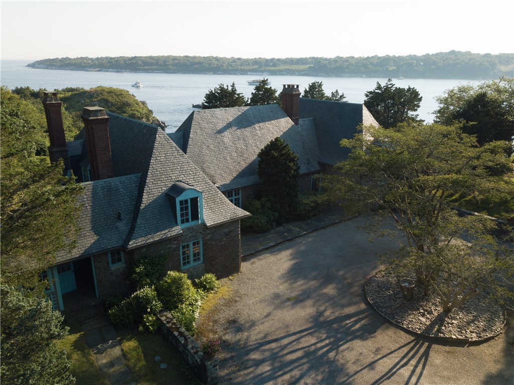 216 Highland Drive Jamestown, RI 02835 - Photo 2 of 39 Built in 1926, Stone House is sited on 2.61 acres of unparalleled waterfront on Mackerel Cove.