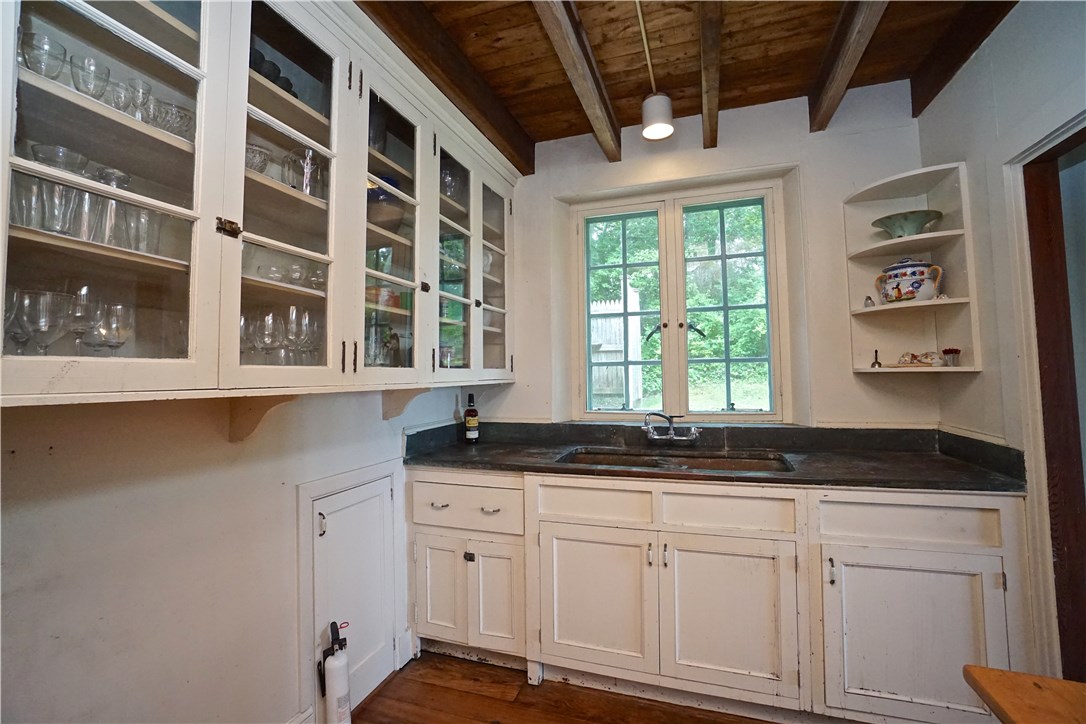 216 Highland Drive Jamestown, RI 02835 - Photo 22 of 39 Butler's Pantry, with original copper sink! This space is 12' x 8'.