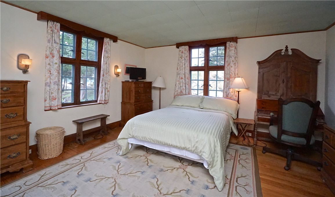 216 Highland Drive Jamestown, RI 02835 - Photo 23 of 39 First level Owner's Bedroom is 15' x 16'.