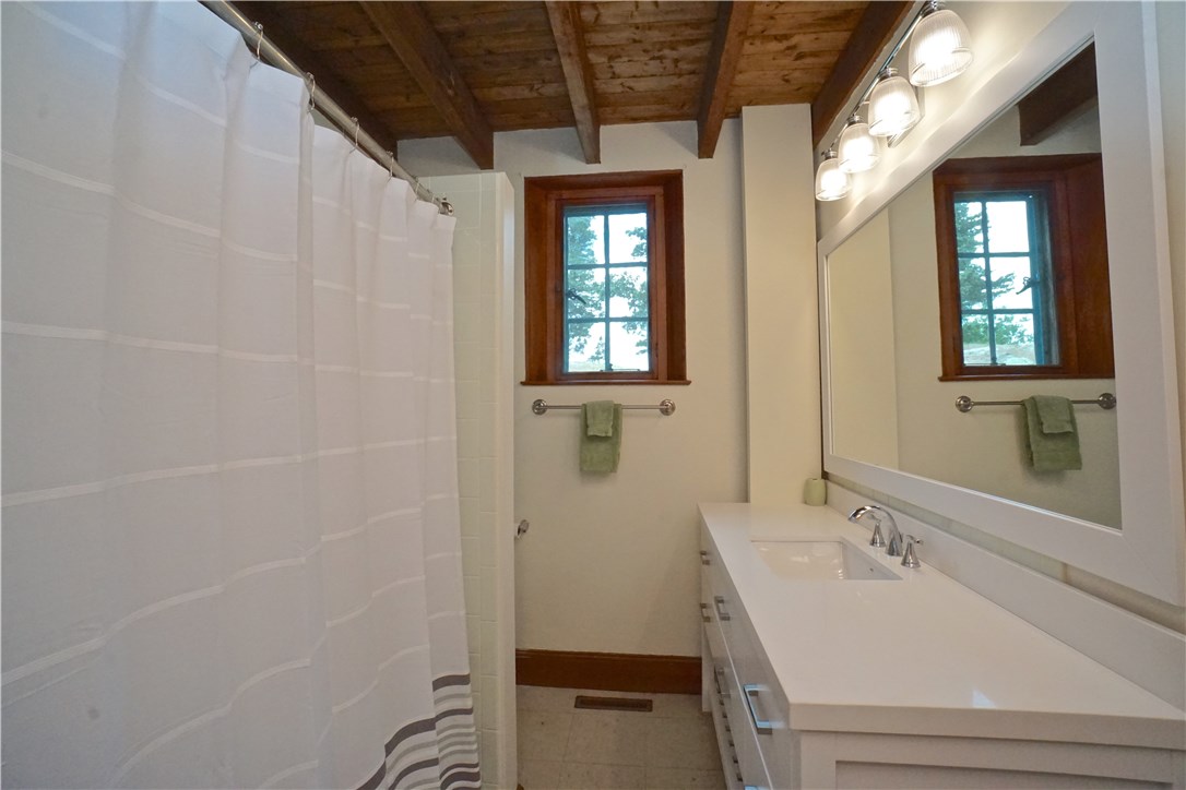 216 Highland Drive Jamestown, RI 02835 - Photo 25 of 39 Full Bath on first level, there is also a half Bath on this level as well.