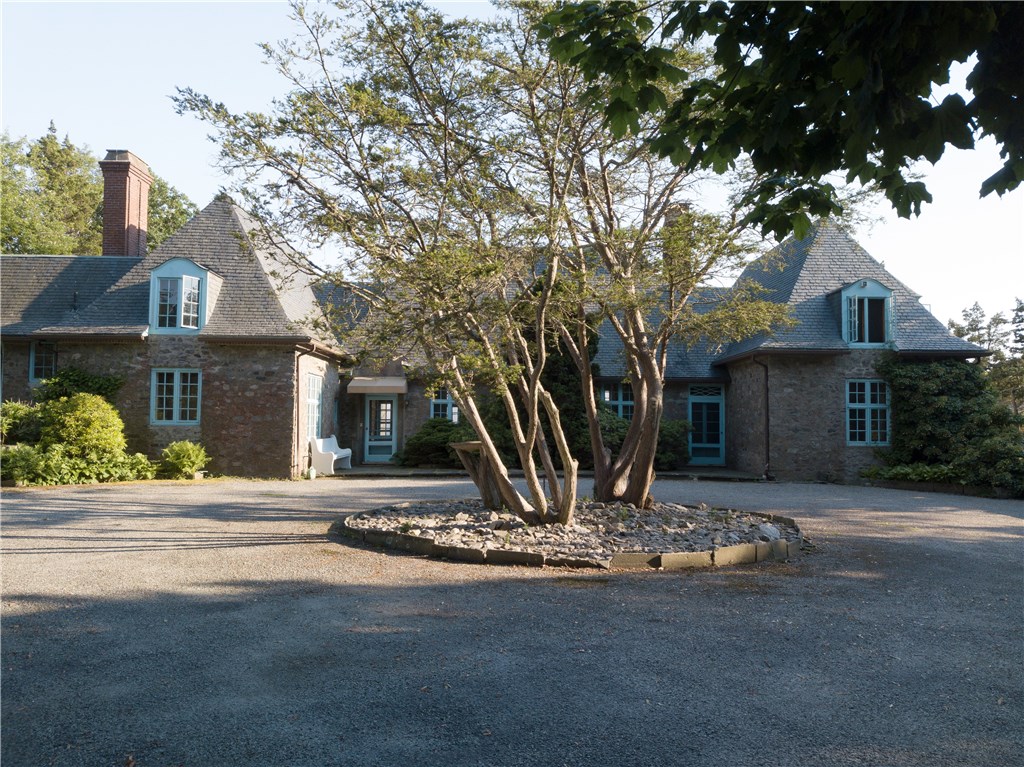216 Highland Drive Jamestown, RI 02835 - Photo 3 of 39 This 'French Provincial' cottage with slate clad roof is simply stunning, with 7 Bedrooms, 3 full and one half Baths.