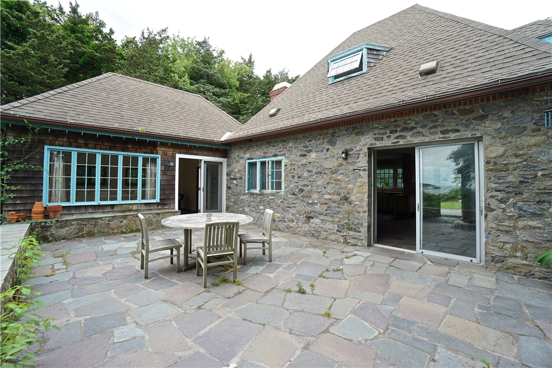 216 Highland Drive Jamestown, RI 02835 - Photo 32 of 39 Flagstones is 707 sq.ft. of living space, with open Living, Kitchen and Dining area, with 1 BR and BA on first level and 1 BR and BA on second level. This has its own 2 BR Advantex septic system.