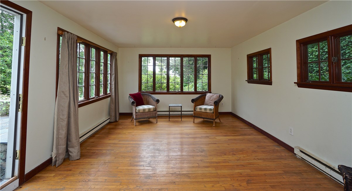 216 Highland Drive Jamestown, RI 02835 - Photo 35 of 39 First level Bedroom at Flagstones, this room is 13' x 18', with access to the terrace.