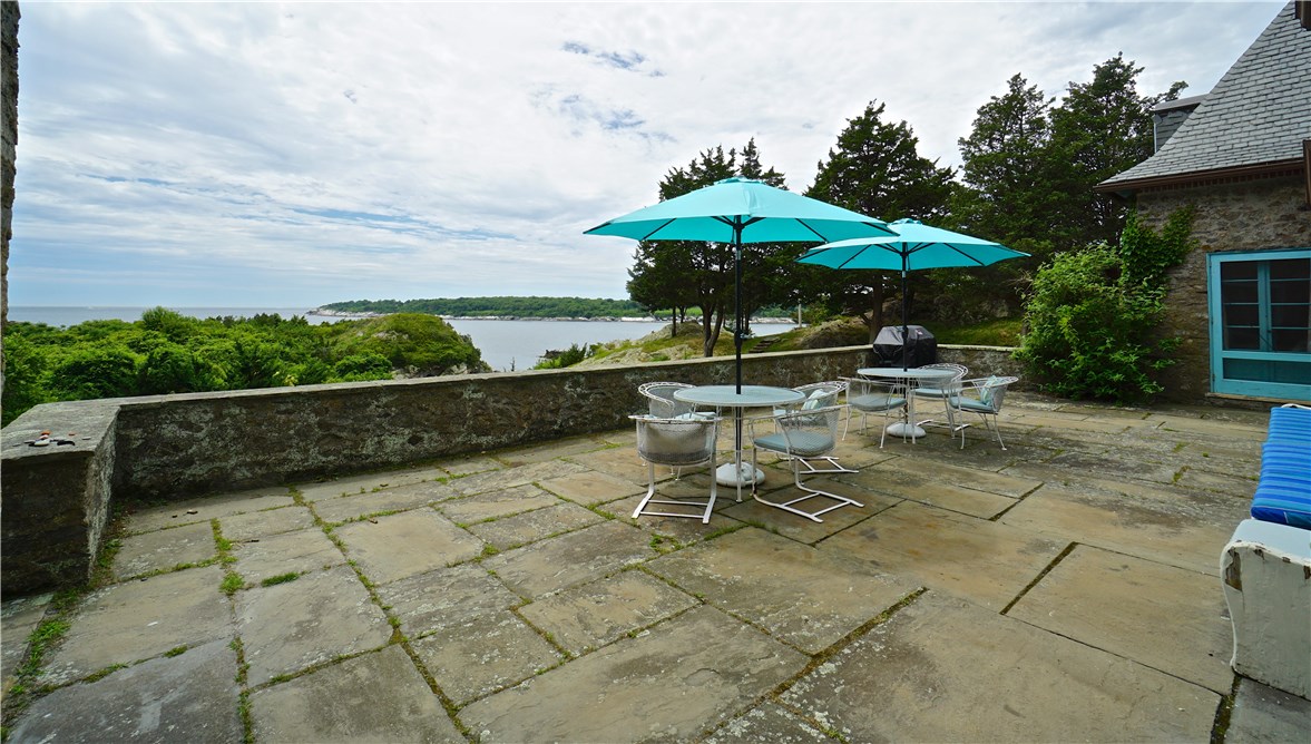 216 Highland Drive Jamestown, RI 02835 - Photo 9 of 39 This terrace is 40' x 19', perfect for dining al fresco, entertaining, and watching the boats go by!