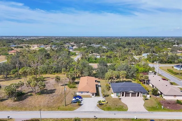 an aerial view of a house with a outdoor space