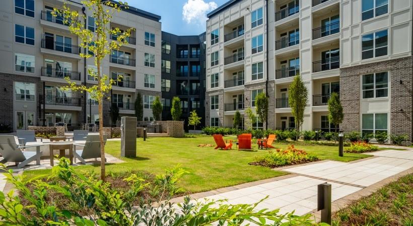 2180 Shadowood Parkway, Unit 434 Atlanta, GA 30339 - Photo 11 of 28 a view of a building with a yard