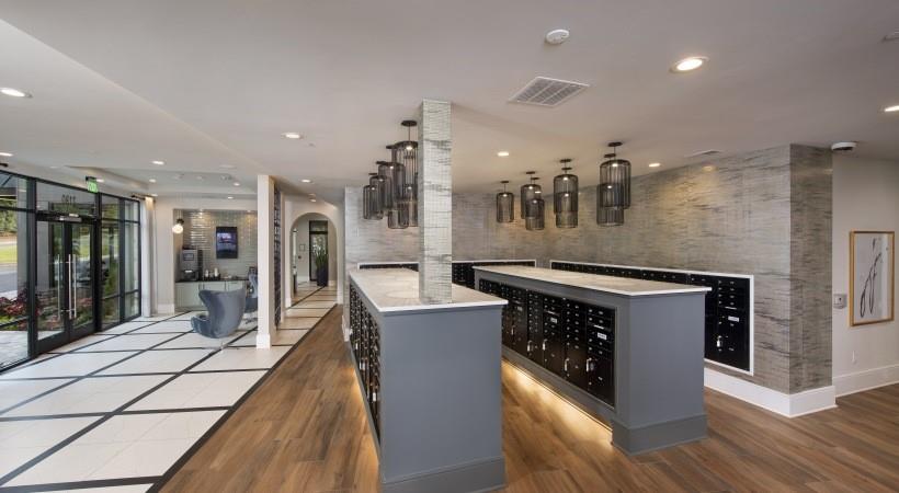 2180 Shadowood Parkway, Unit 434 Atlanta, GA 30339 - Photo 15 of 28 a kitchen with stainless steel appliances granite countertop a stove a sink and a refrigerator