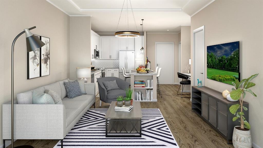 2180 Shadowood Parkway, Unit 434 Atlanta, GA 30339 - Photo 2 of 28 a living room with furniture a flat screen tv and a floor to ceiling window