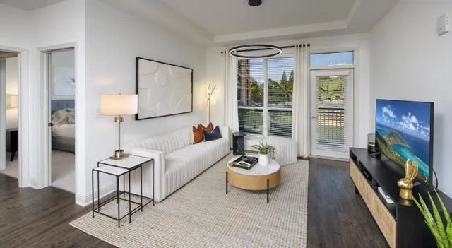 a living room with furniture and a window