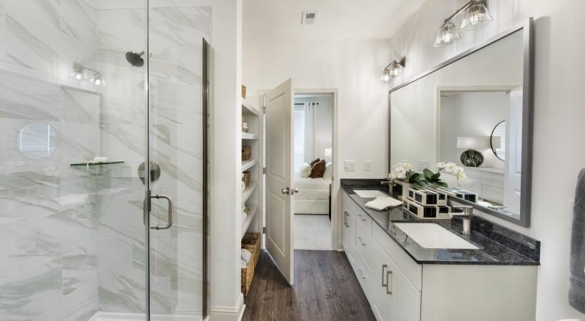 2180 Shadowood Parkway, Unit 434 Atlanta, GA 30339 - Photo 9 of 28 a bathroom with a granite countertop sink a mirror and shower