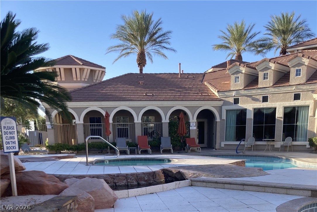 10550 West Alexander Road, Unit 2025 Las Vegas, NV 89129 - Photo 3 of 19 Community Pool and Clubhouse