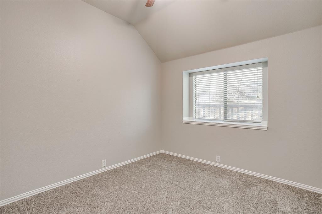 928 Remington Ranch Road Mansfield, TX 76063 - Photo 16 of 20 an empty room with a window