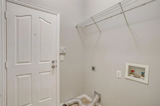 a view of a room with racks on the wall