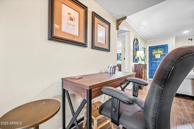 a view of a dining room with furniture and window