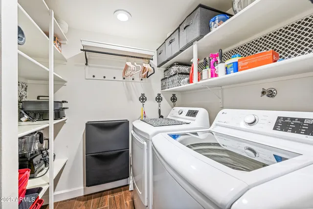 a utility room with dryer and washer