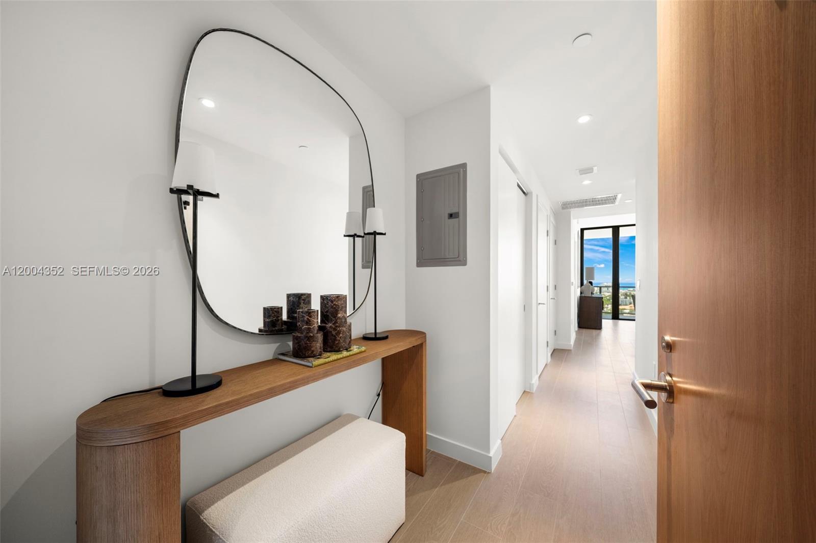 500 Alton Road, Unit 1707 Miami Beach, FL 33139 - Photo 13 of 52 a room with view of hallway and bathroom