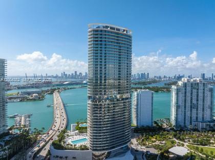 500 Alton Road, Unit 1707 Miami Beach, FL 33139 - Photo 17 of 52 a view of a lake with a city skyline in the background