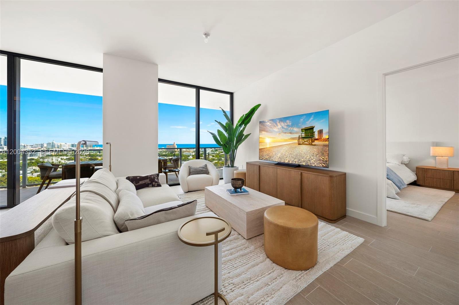 500 Alton Road, Unit 1707 Miami Beach, FL 33139 - Photo 37 of 52 a living room with furniture and a large window
