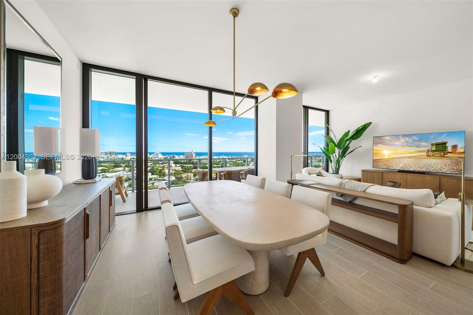 500 Alton Road, Unit 1707 Miami Beach, FL 33139 - Photo 39 of 52 a living room with furniture and a large window