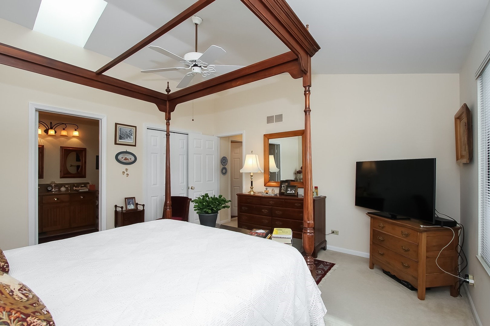 842 Oak Hill Road Lake Barrington, IL 60010 - Photo 16 of 36 a bedroom with a bed and a flat screen tv