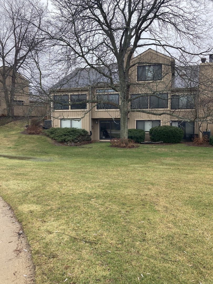 842 Oak Hill Road Lake Barrington, IL 60010 - Photo 2 of 36 a view of a building with a yard
