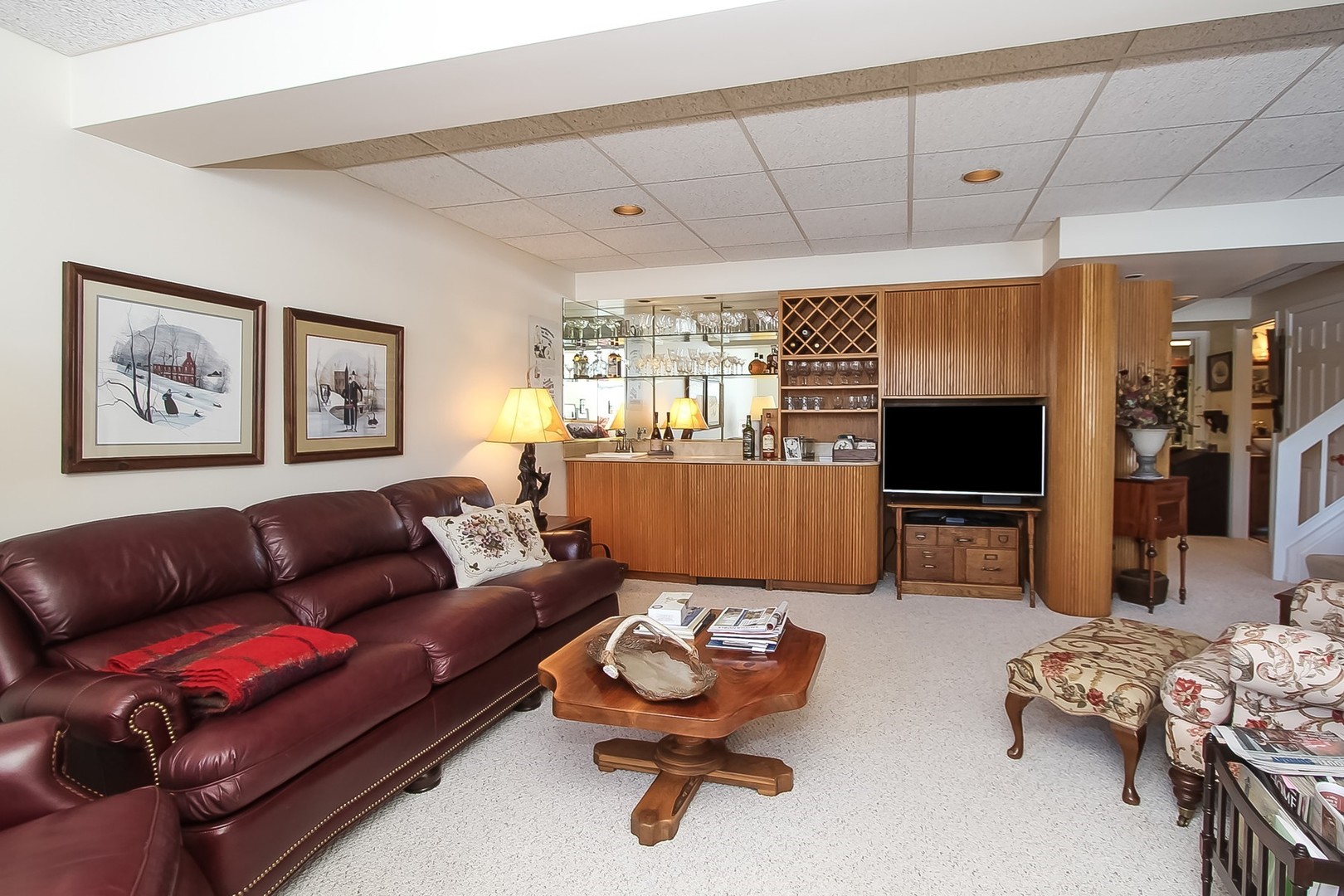 842 Oak Hill Road Lake Barrington, IL 60010 - Photo 23 of 36 a living room with furniture a flat screen tv and kitchen view