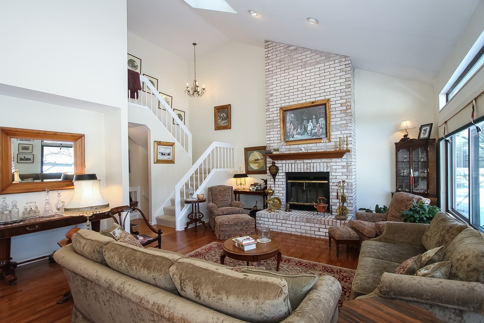 842 Oak Hill Road Lake Barrington, IL 60010 - Photo 4 of 36 a living room with furniture and a fireplace