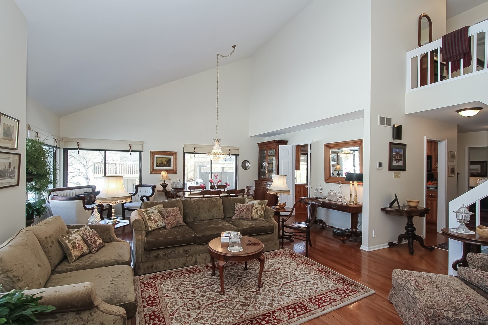 842 Oak Hill Road Lake Barrington, IL 60010 - Photo 5 of 36 a living room with furniture and a large window