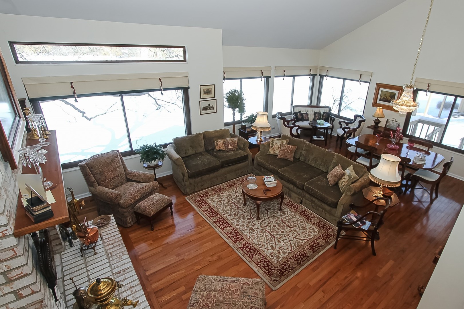 842 Oak Hill Road Lake Barrington, IL 60010 - Photo 6 of 36 a living room with furniture and a large window