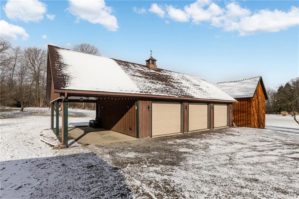 828 Clintonville Road Mercer, PA 16137 - Photo 23 of 49 Massive 3 car garage with additional parking or picnic area
