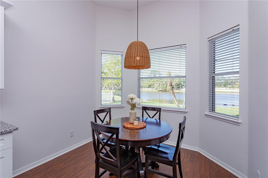 1572 St Regis Point Sanford, FL 32771 - Photo 14 of 30 a view of a dining room with furniture window and outside view