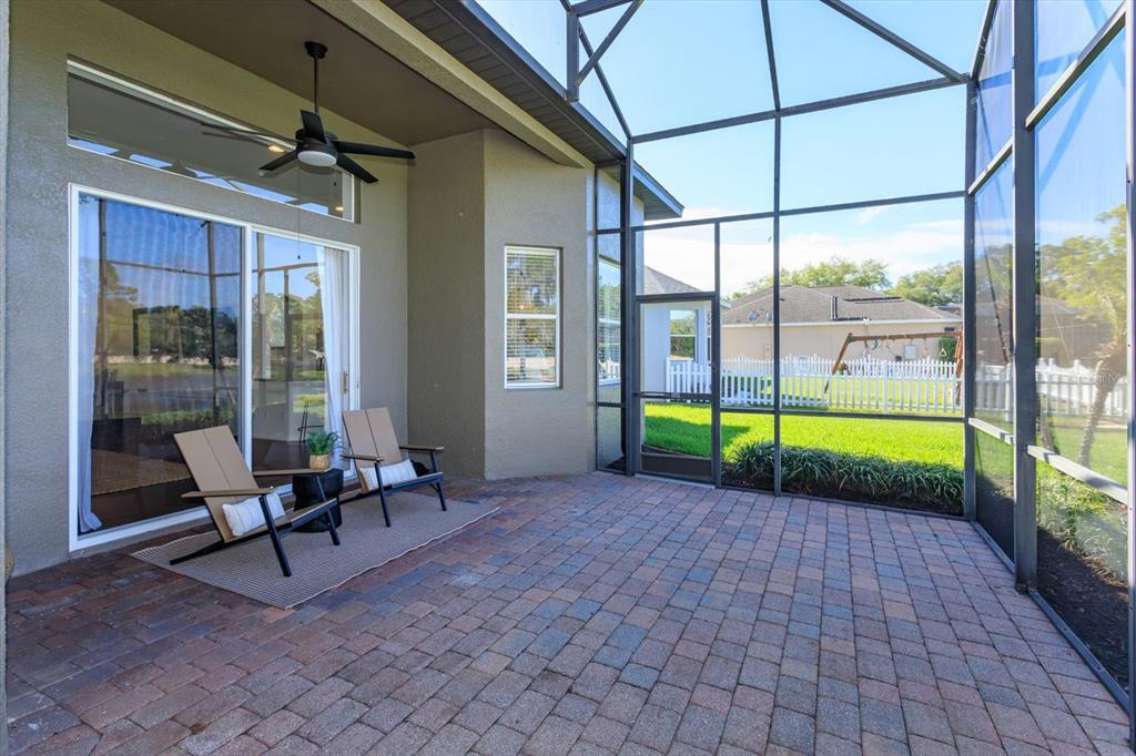 1572 St Regis Point Sanford, FL 32771 - Photo 23 of 30 a view of a swimming pool with a back yard