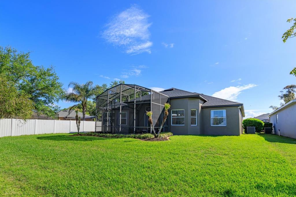 1572 St Regis Point Sanford, FL 32771 - Photo 27 of 30 a view of a house with a yard