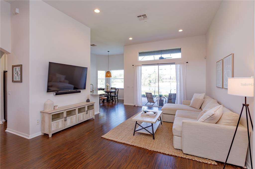 1572 St Regis Point Sanford, FL 32771 - Photo 6 of 30 a living room with furniture and a flat screen tv