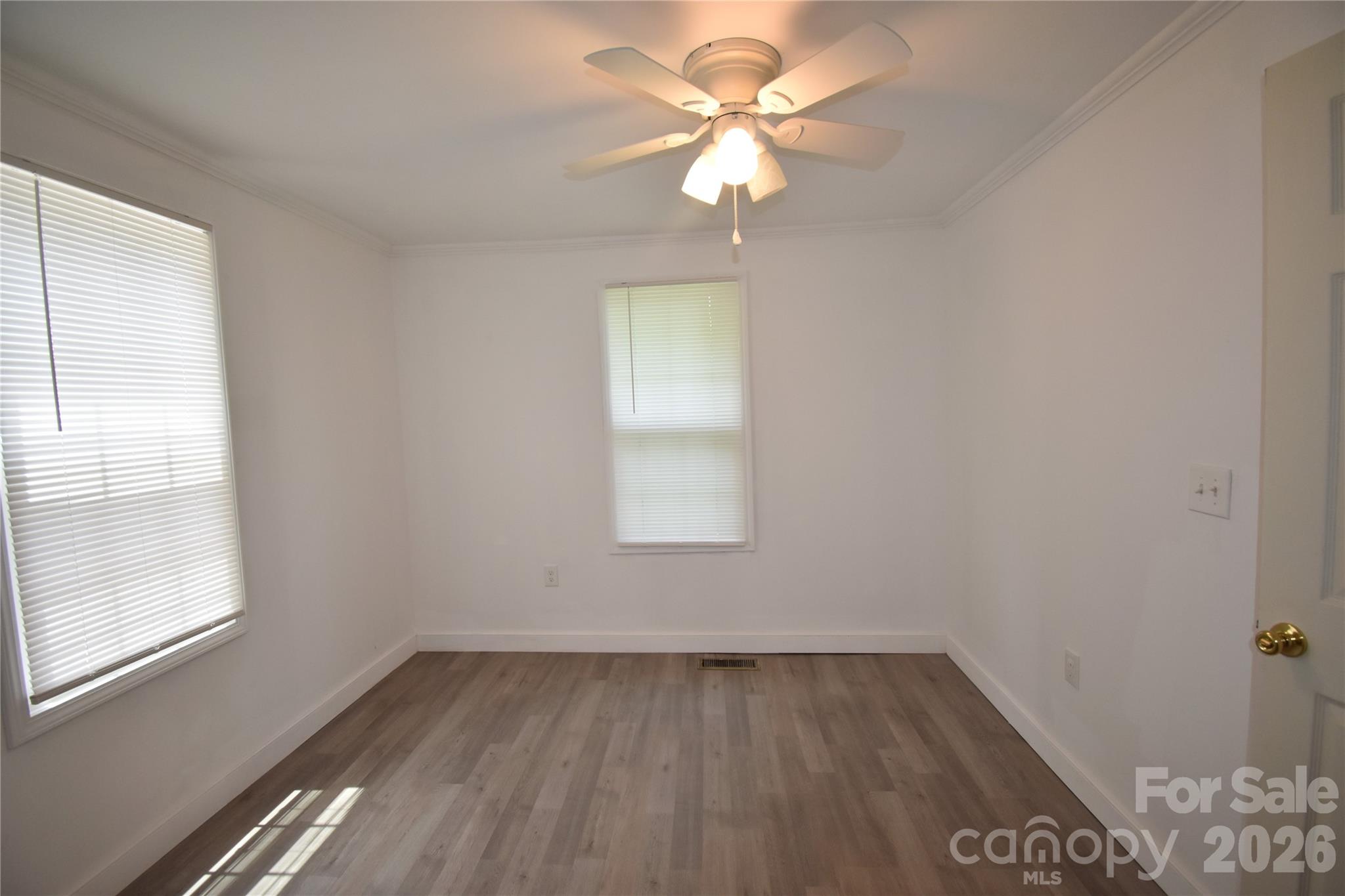 622 Green St Loop Marion, NC 28752 - Photo 12 of 16 an empty room with a window