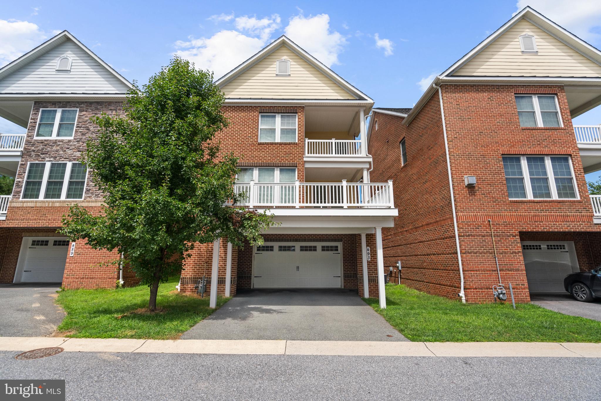 493 Watkins Mill Road Gaithersburg, MD 20878 - Photo 59 of 59 Charming brick townhouse with balconies.