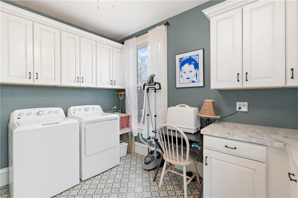 1000 River Road Beaver, PA 15009 - Photo 17 of 25 a view of kitchen and utility room with washer and dryer