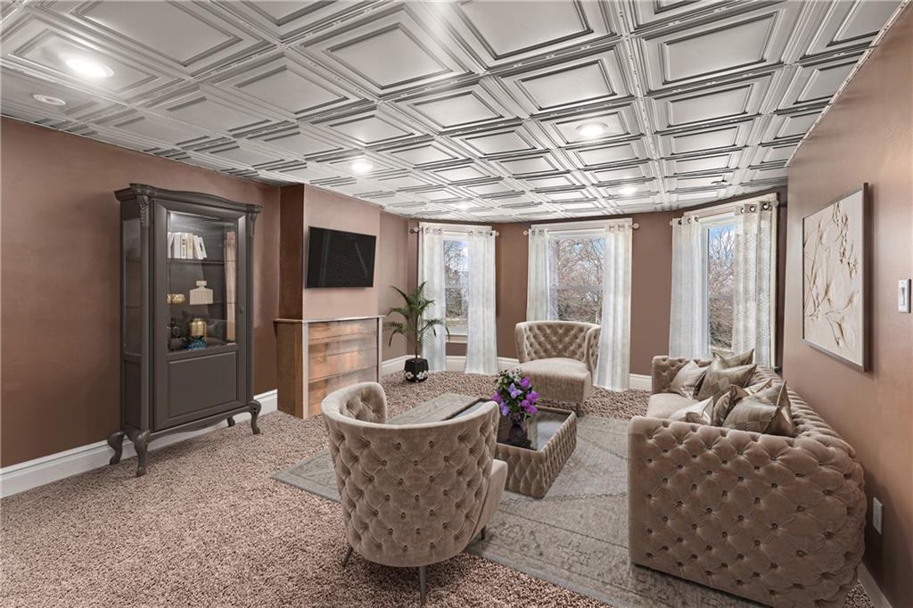 1000 River Road Beaver, PA 15009 - Photo 21 of 25 a living room with furniture and a flat screen tv