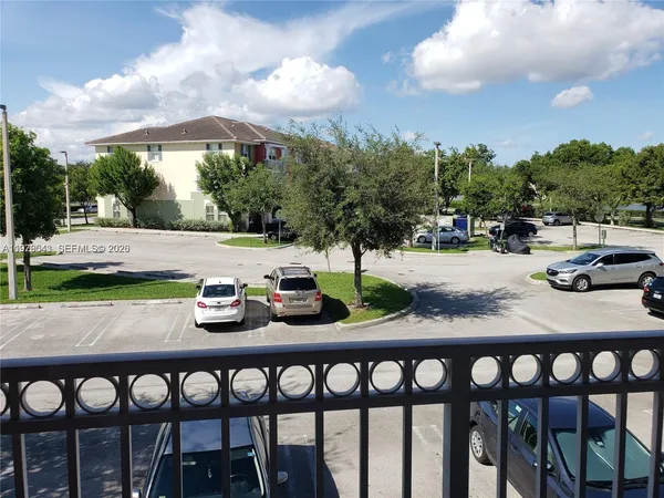 a view of a yard with furniture
