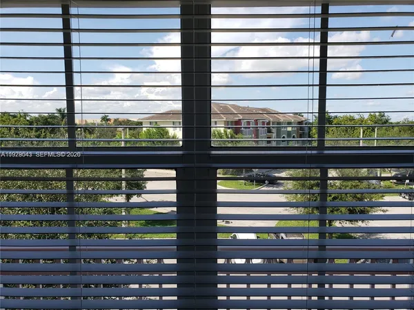a bathroom with a bathtub and a toilet