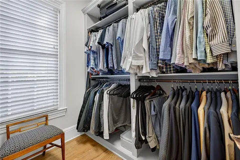 a bathroom with a sink a mirror and a toilet