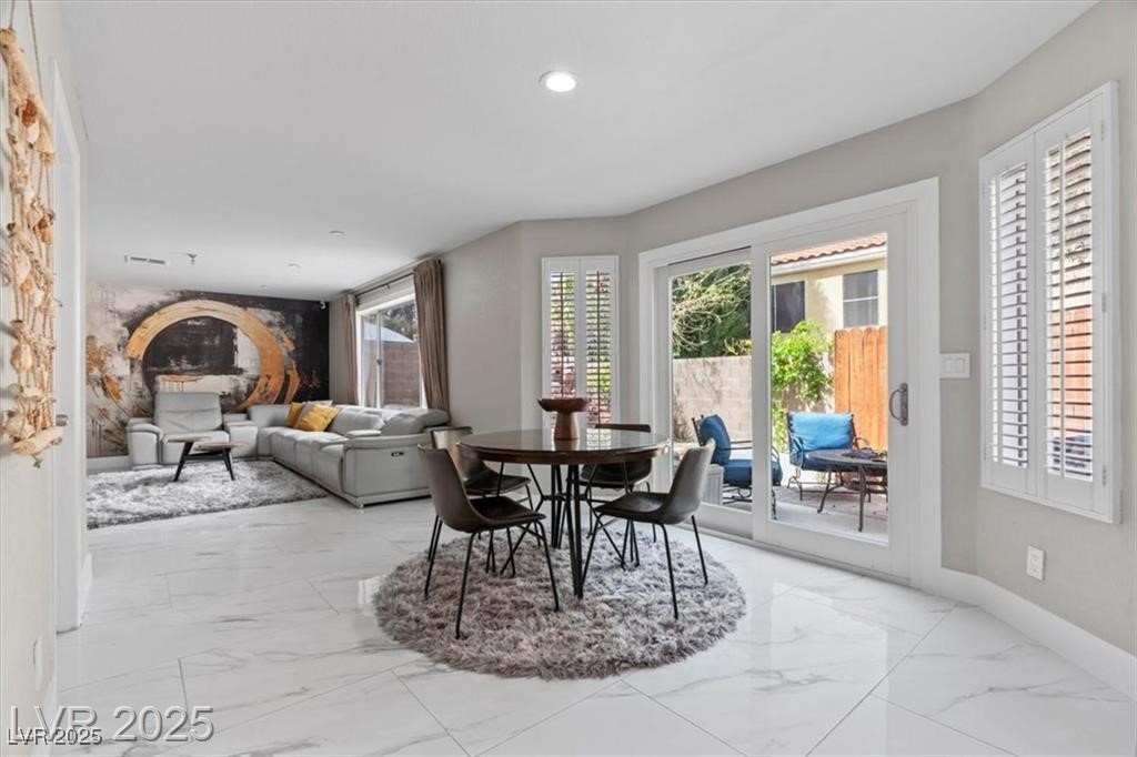 9416 Rolling Ridge Lane Las Vegas, NV 89134 - Photo 15 of 34 Dining space with light marble finish flooring and recessed lighting