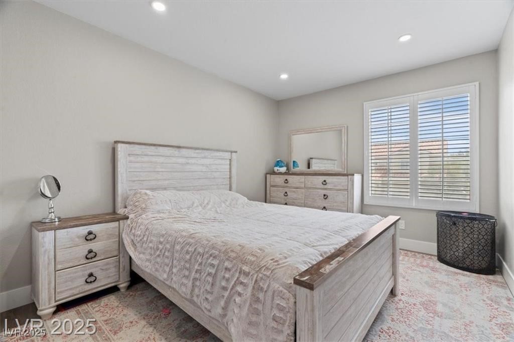 9416 Rolling Ridge Lane Las Vegas, NV 89134 - Photo 19 of 34 Bedroom featuring baseboards and recessed lighting