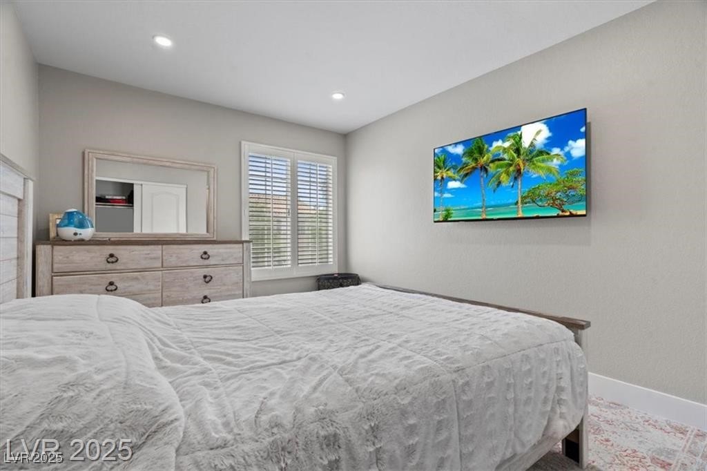 9416 Rolling Ridge Lane Las Vegas, NV 89134 - Photo 20 of 34 Bedroom with baseboards and recessed lighting